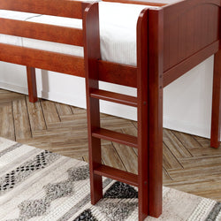 Wooden bunk bed ladder on herringbone floor with patterned rug.