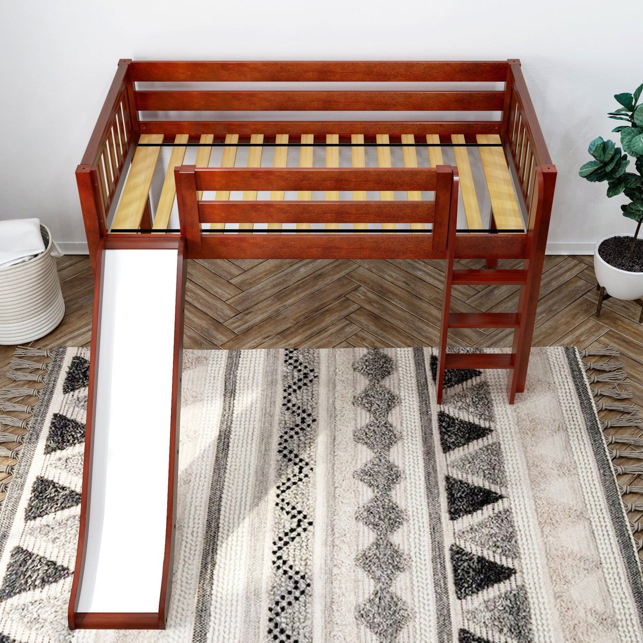 Wooden loft bed with slide and ladder, designed for children's bedroom furniture.