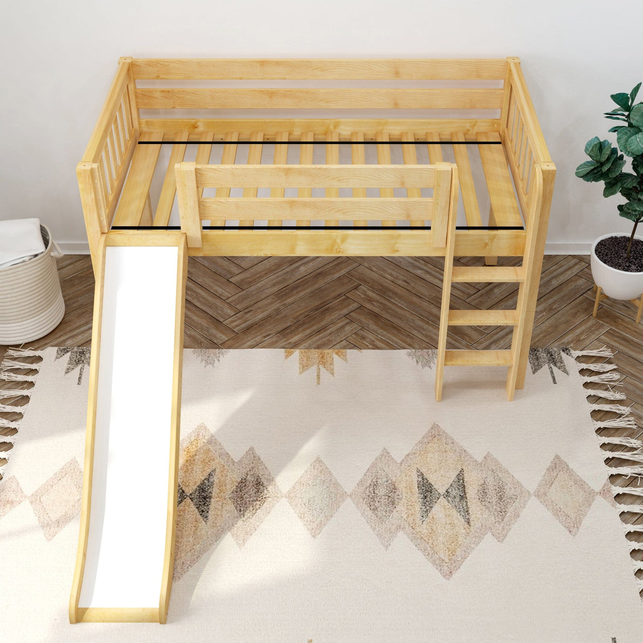 Kids wooden loft bed with slide and ladder in modern bedroom setting.