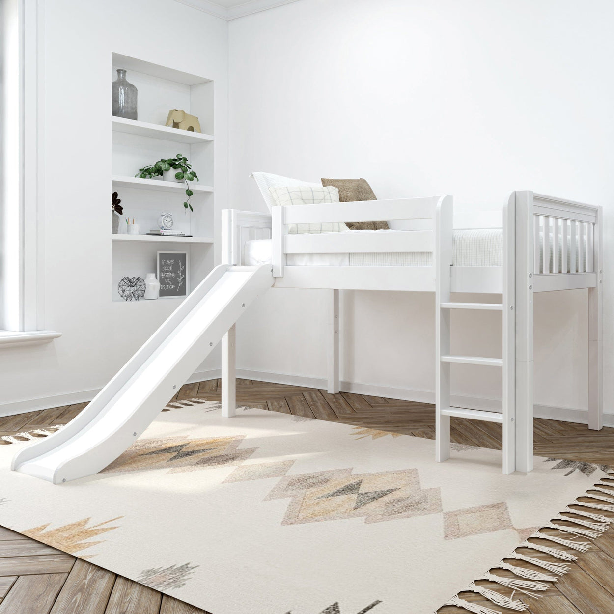 White loft bed with slide and ladder in a modern children’s room with decorative shelving.