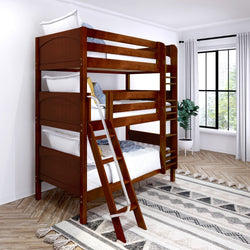 Wooden bunk bed with ladder in modern bedroom interior featuring geometric rug and large window.
