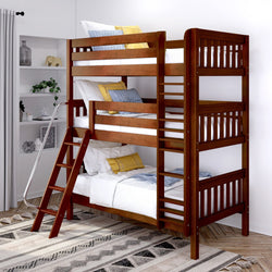 Triple bunk bed with ladder in modern bedroom featuring cozy pillows and stylish decor.