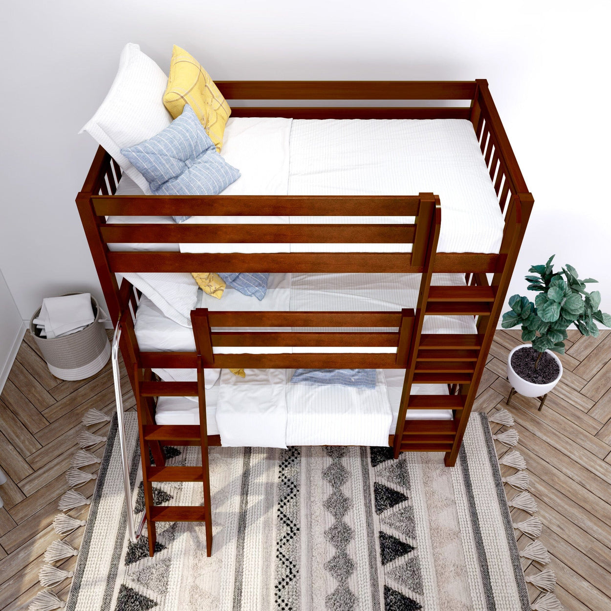 Stylish wooden bunk bed with ladder in modern bedroom featuring cozy pillows, a decorative rug, and potted plant.