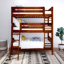 Triple bunk bed with wooden frame, white bedding, and colorful pillows in a modern bedroom setting.