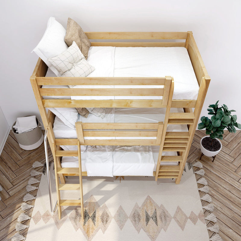 Top-down view of a natural wood twin-over-twin bunk bed with white bedding, neutral throw pillows, ladder and potted plant in a cozy kids' bedroom.