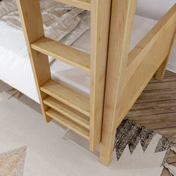 Wooden bunk bed ladder with cozy bedding in a modern bedroom.