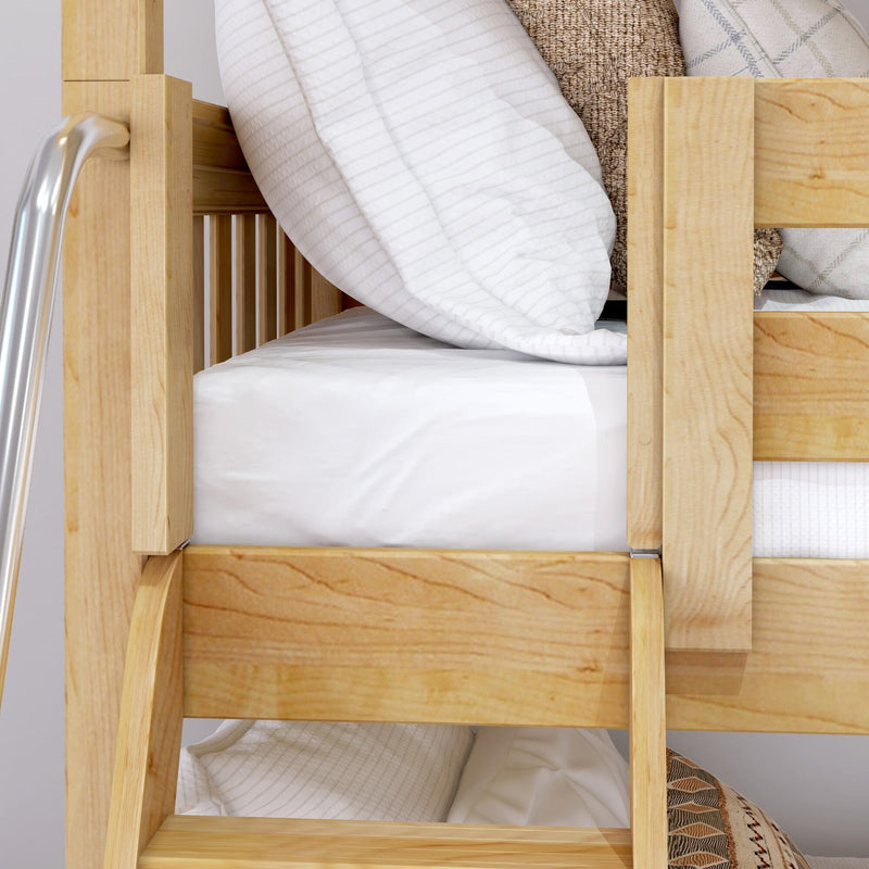 Close-up of light wooden bunk bed with ladder, white striped bedding and pillows, natural wood-grain finish and cozy neutral throw in kids' bedroom
