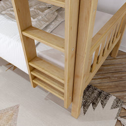Wooden bunk bed ladder with striped bedding and wooden floor.