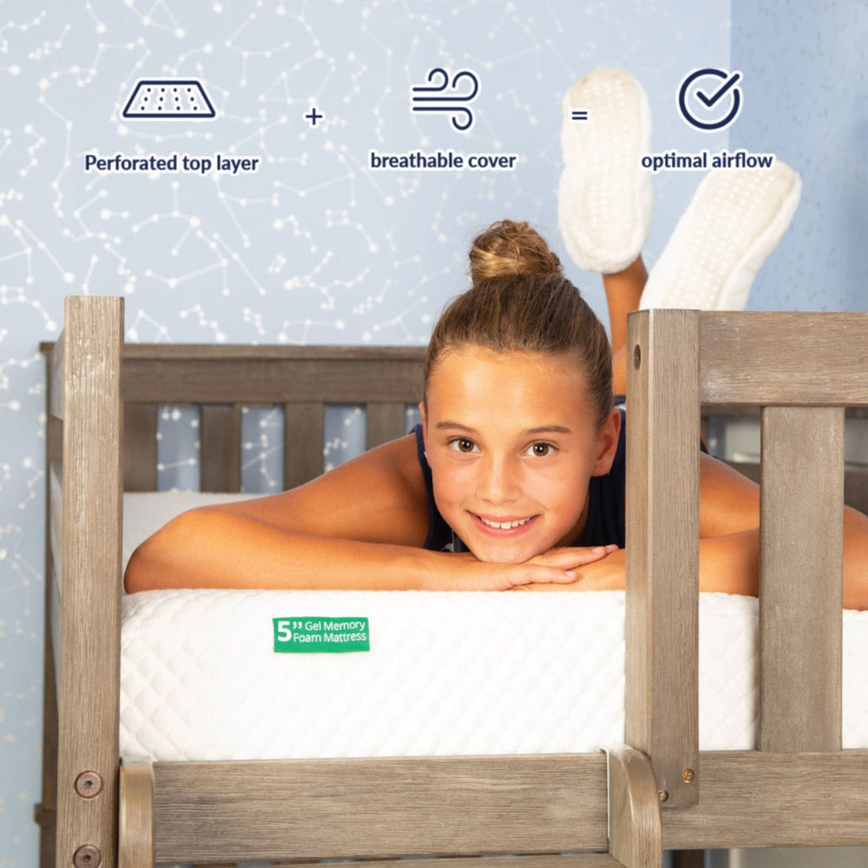 Child lying on gel memory foam mattress showing breathable cover and optimal airflow.