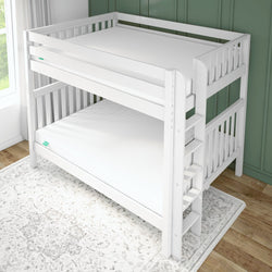 White wooden bunk bed with a modern design in a cozy bedroom setting.