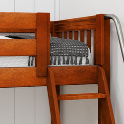 Wooden loft bed with ladder and blanket against a white wall.