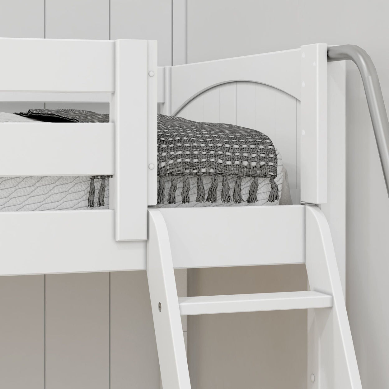 White wooden bunk bed with ladder and gray woven blanket in modern bedroom.
