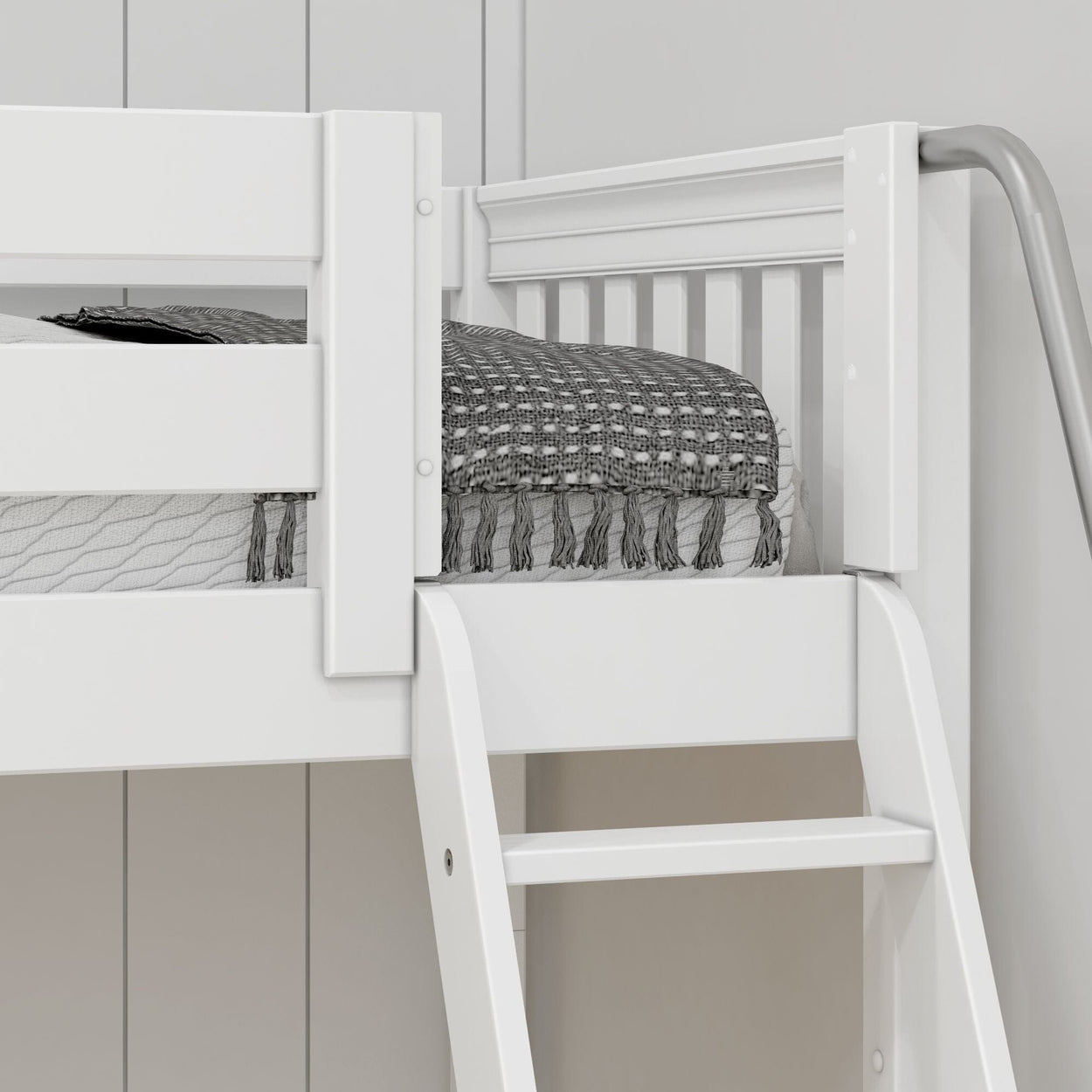 White bunk bed with a cozy gray blanket and safety railing, featuring a sturdy ladder for easy access.