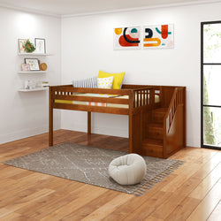Stylish wooden loft bed with stairs in modern children's room featuring colorful wall art and cozy pillows.