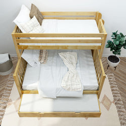 Wooden bunk bed with trundle — twin-over-full natural pine frame, white striped bedding and decorative pillows in a space-saving kids bedroom with potted plant, woven basket and neutral rug