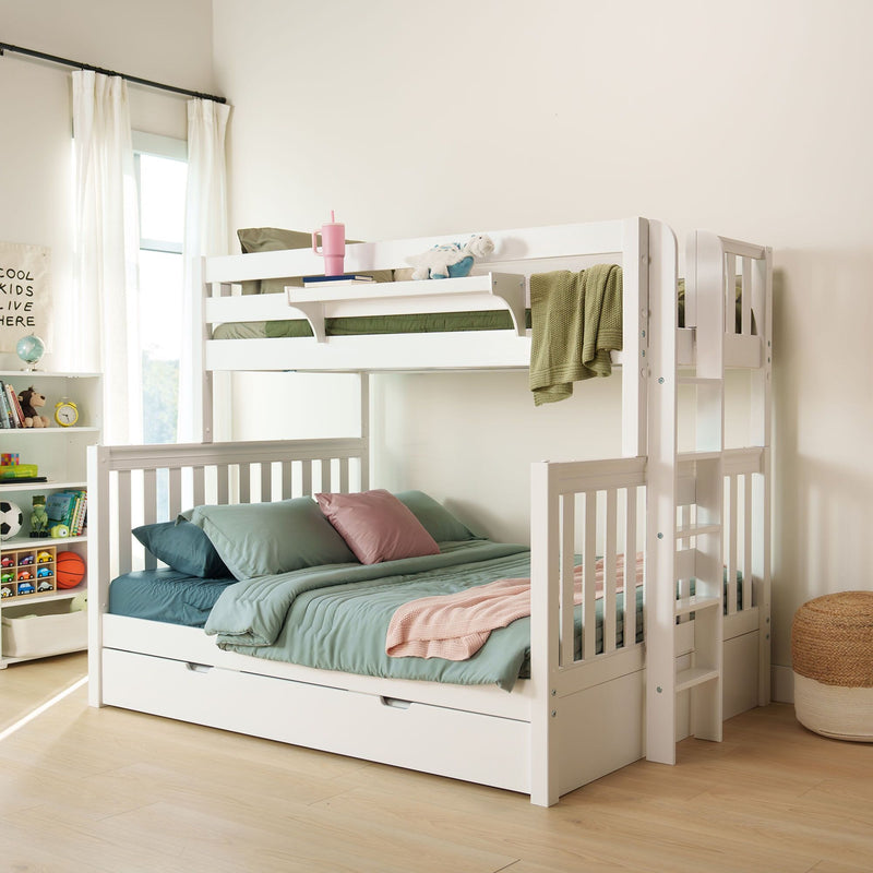 Modern white wooden bunk bed in a bright kids' bedroom with green bedding, ladder, under-bed storage drawers, plush toy and toy-filled bookshelf by a sunlit window