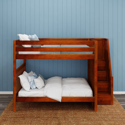 Wooden bunk bed with a ladder and white bedding against a blue paneled wall in a modern bedroom.