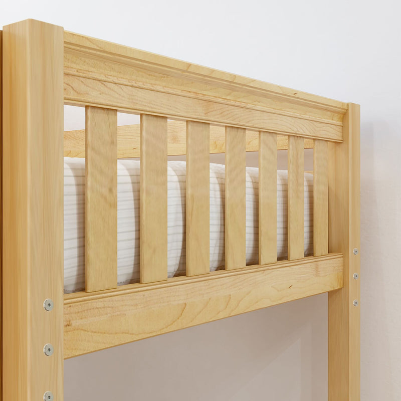 Close-up of natural light wooden bunk bed guardrail and slatted headboard with striped mattress against a white wall