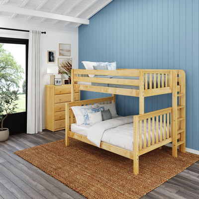 Wooden bunk bed in a modern bedroom with blue accent wall and natural light streaming through a window.