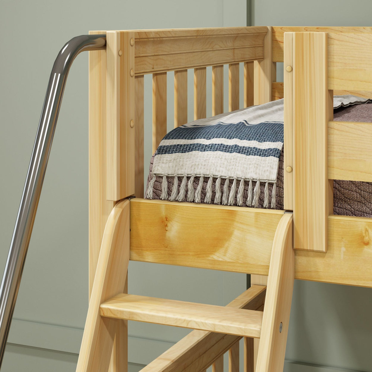 Wooden loft bed with safety rail, ladder, and cozy bedding.