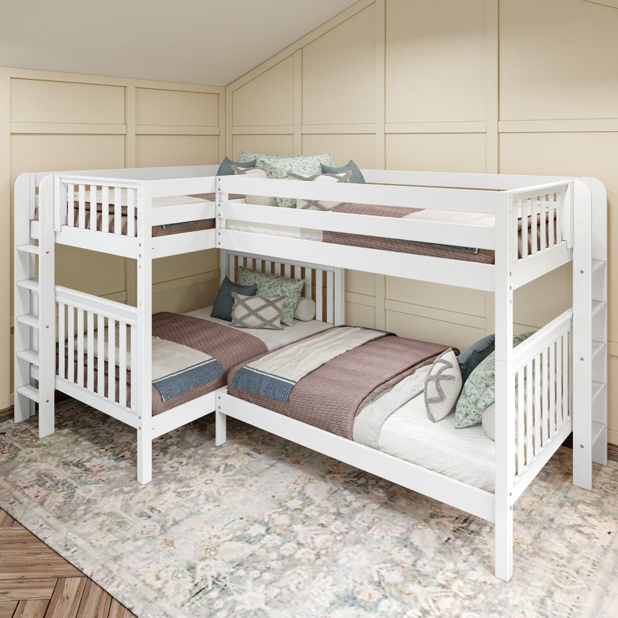 White wooden L-shaped bunk bed with mattresses, pillows, and cozy bedding in a modern bedroom with light wood paneling and a patterned rug.