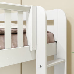 White wooden bunk bed frame with beige bedding, ideal for children's room decor.
