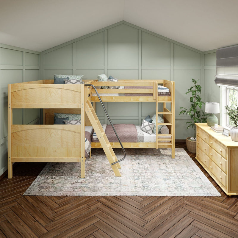 Wooden bunk beds in a cozy kids' bedroom with sage green paneled accent wall, vaulted ceiling, natural wood dresser and houseplants