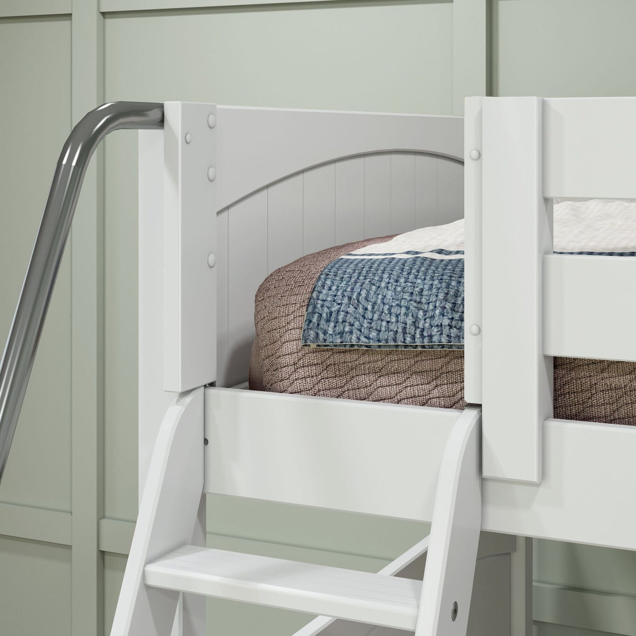 White wooden bunk bed with safety rail and colorful bedding set, metal ladder for easy access in modern bedroom design.