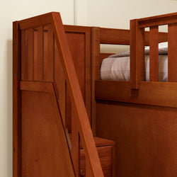 Wooden bunk bed with built-in steps and railing in a cozy bedroom setting.