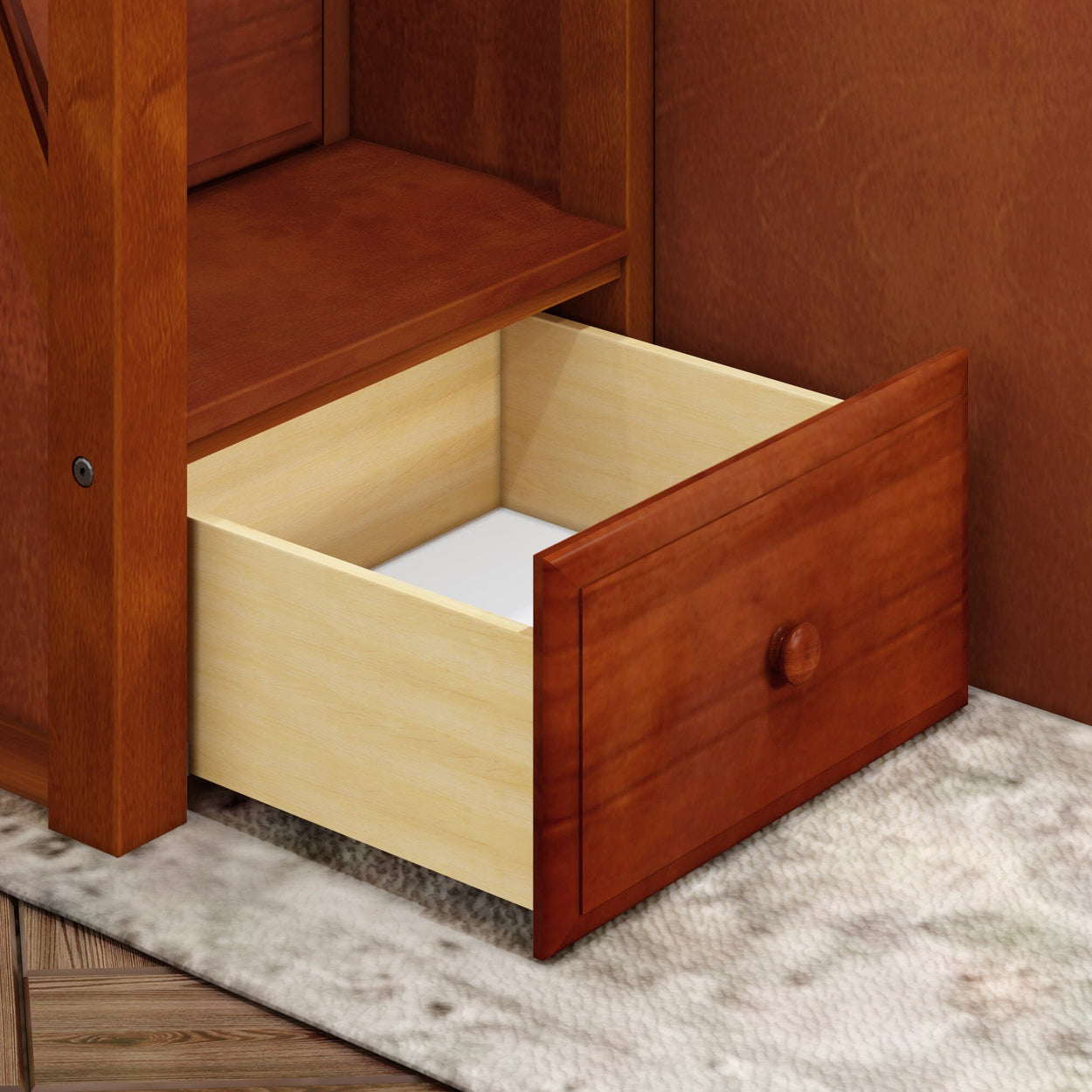 Open wooden drawer in brown dresser for home storage solutions.