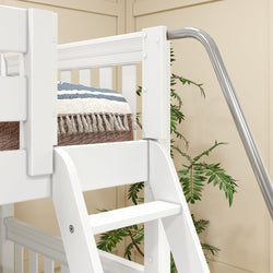 White wooden loft bed with ladder and blue striped blanket, surrounded by indoor plants.
