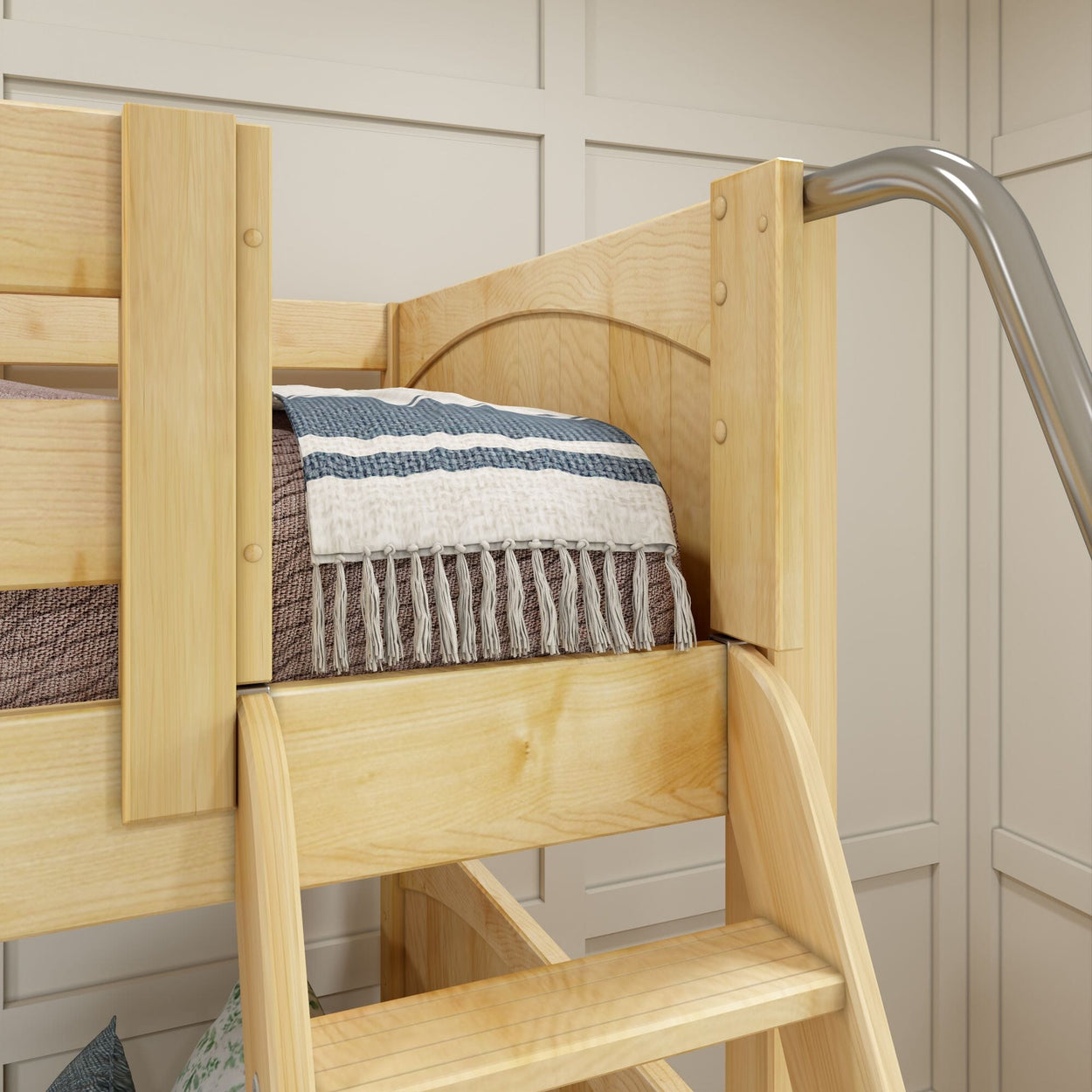 Wooden bunk bed with striped blanket and modern design in a cozy bedroom.