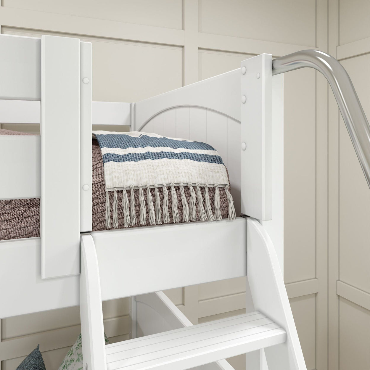 White loft bed with striped blanket and ladder in modern bedroom setup.