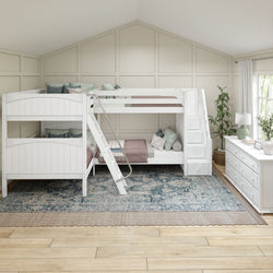 Modern kids' bedroom with white bunk beds, storage stairs, and cozy decor in a bright, spacious interior.