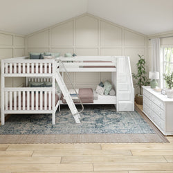 Triple bunk bed with white frame in a cozy children's room featuring pastel bedding and a rustic area rug.