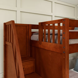 Rustic wooden loft bed with built-in storage stairs and cozy gray bedding in a modern bedroom setting.