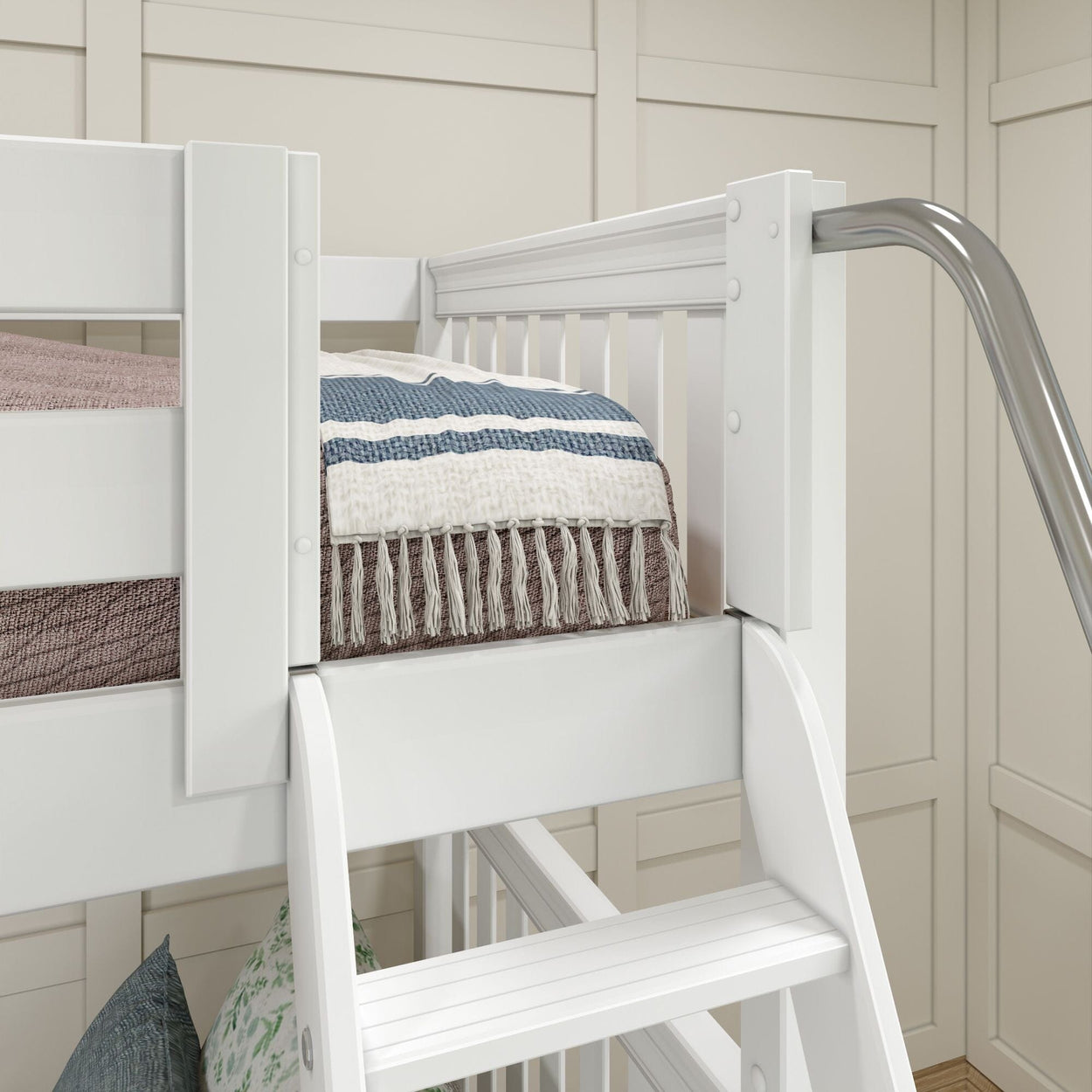 White wooden bunk bed with a cozy striped blanket and modern slide design.