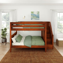 Wooden bunk bed with green bedding in a bright, modern bedroom featuring a potted plant and artwork.