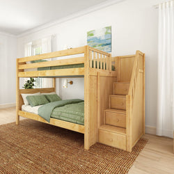 Wooden bunk bed with staircase and green bedding in a bright bedroom.