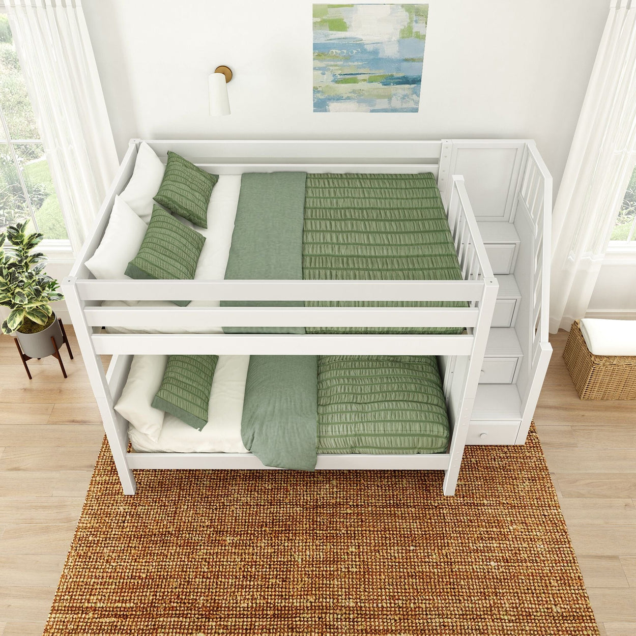 White bunk bed with green bedding in a modern bedroom, featuring stair storage and a woven rug.