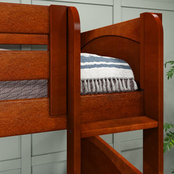 Wooden bunk bed with cozy striped blanket in a modern bedroom setting.