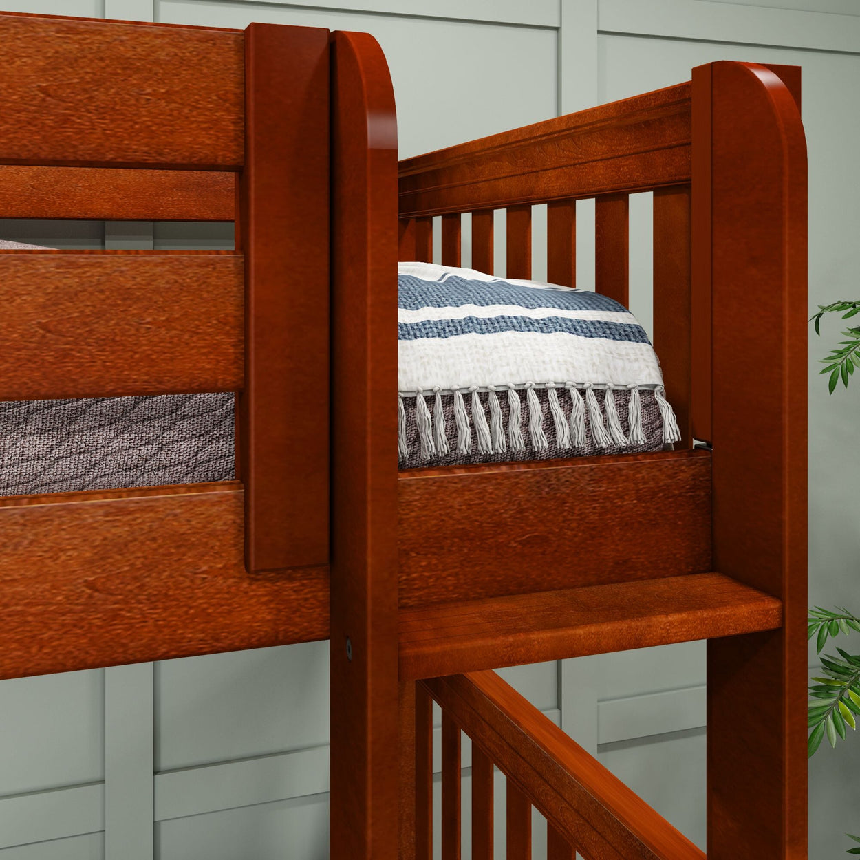 Wooden bunk bed frame with cozy blue-striped bedding in modern bedroom decor.