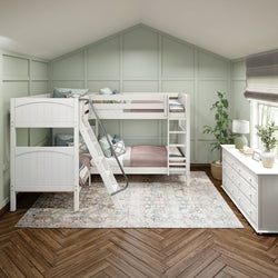 Modern kids' bedroom with white bunk bed, pastel walls, and wooden flooring.