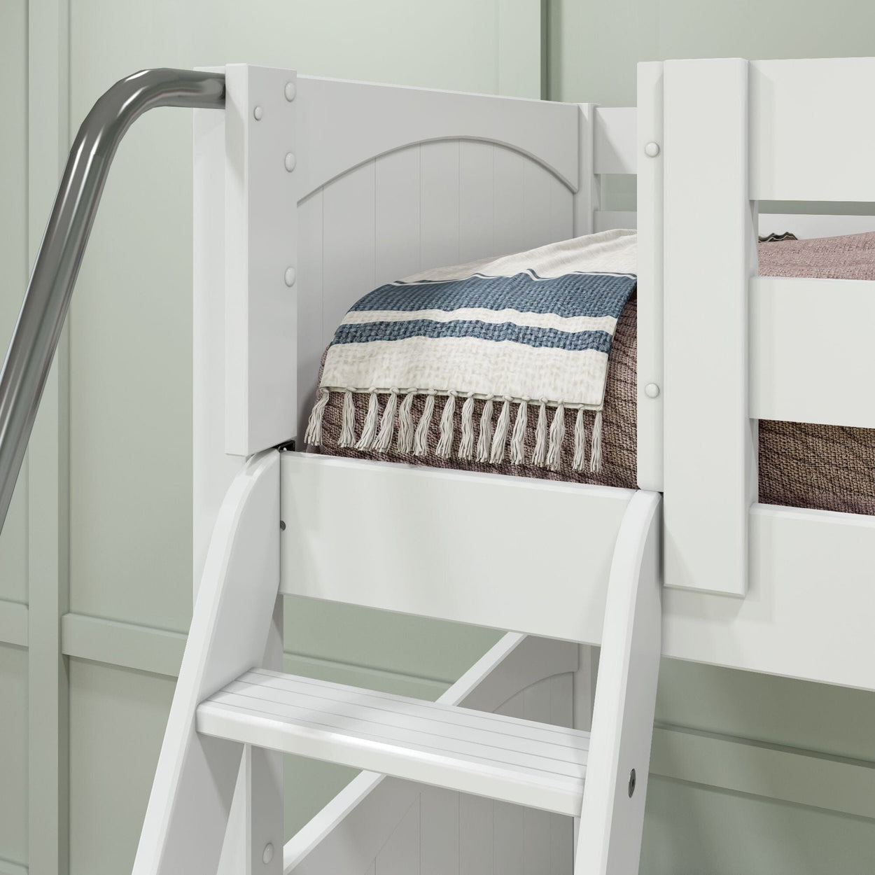 White loft bed corner with striped blanket and ladder in a modern bedroom setup.