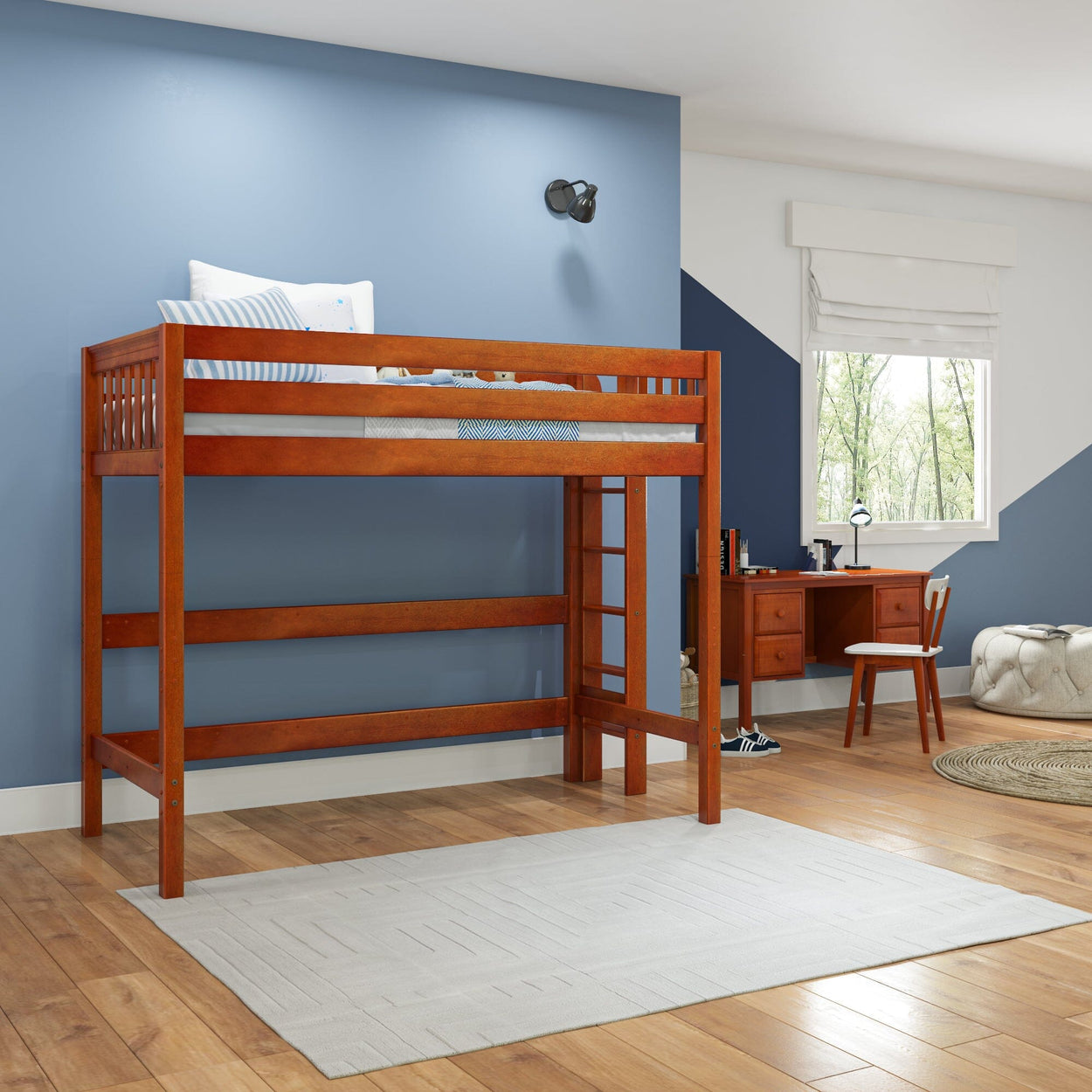 Wooden loft bed for kids in modern bedroom with blue walls and study desk.