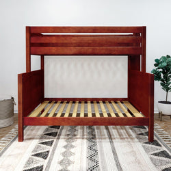 Wooden bunk bed frame on patterned rug in modern bedroom.