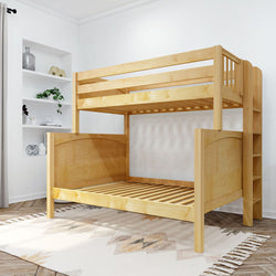 Wooden bunk bed in modern bedroom with decorative shelves and geometric rug.