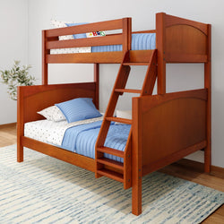 Wooden bunk bed with blue bedding and decorative pillows in a modern bedroom.