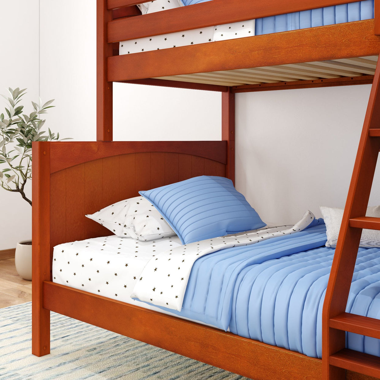 Wooden bunk bed with blue bedding in a modern bedroom setting.