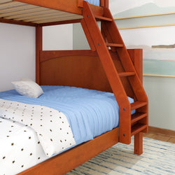 Rustic wooden bunk bed with blue bedding and star-patterned comforter in a modern bedroom setting.